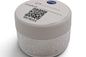 A small clear plastic jar with a white screw-top lid, filled with clear rimless spectacle plugs. The lid has printed fields and a QR code, including the words 'QTY', 'Product', and 'REORDER'.